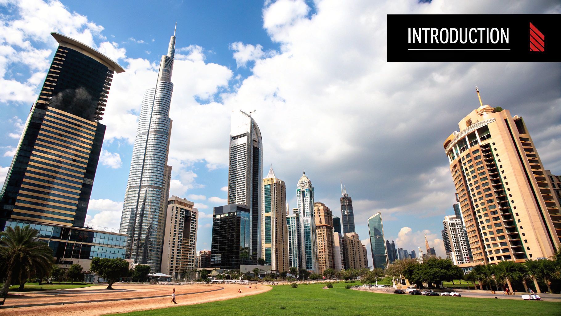 Dubai skyline with skyscrapers under a cloudy sky, featuring the Burj Khalifa.