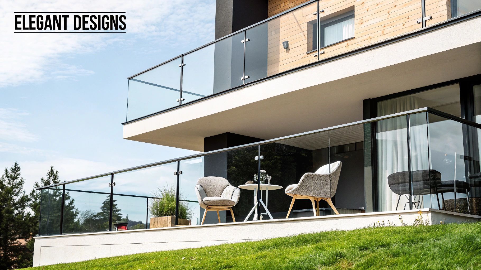 Balcony with glass railing and modern furniture on a sunny day.