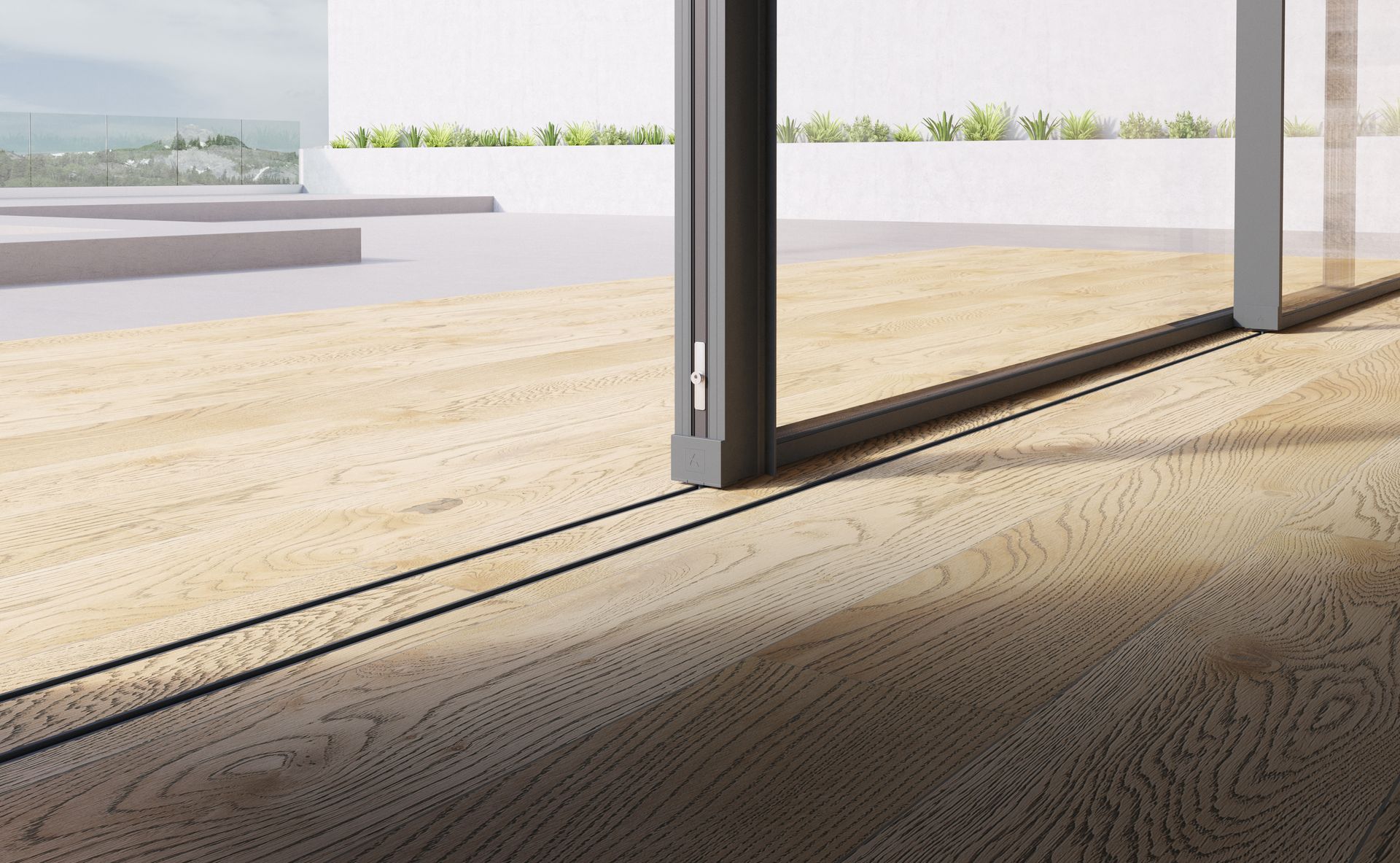 A sliding glass door is open to a wooden deck.