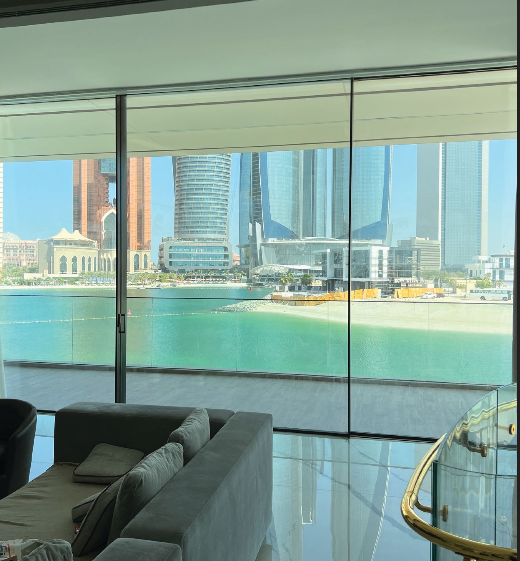 There is a sliding glass door in the middle of the room.
