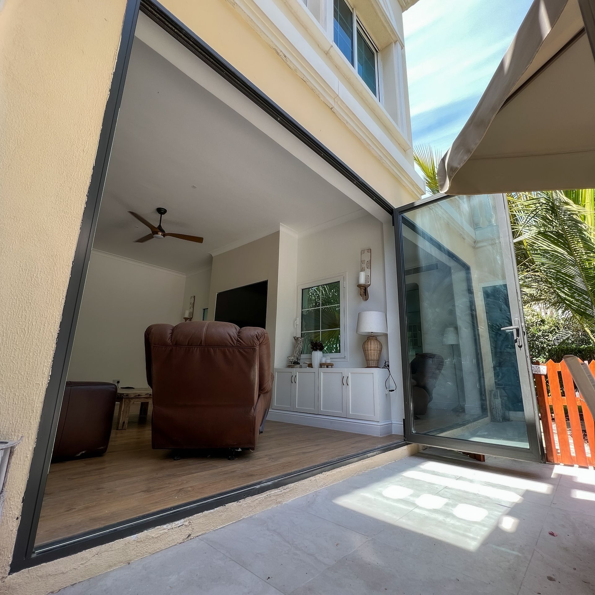 A living room with a large sliding glass door