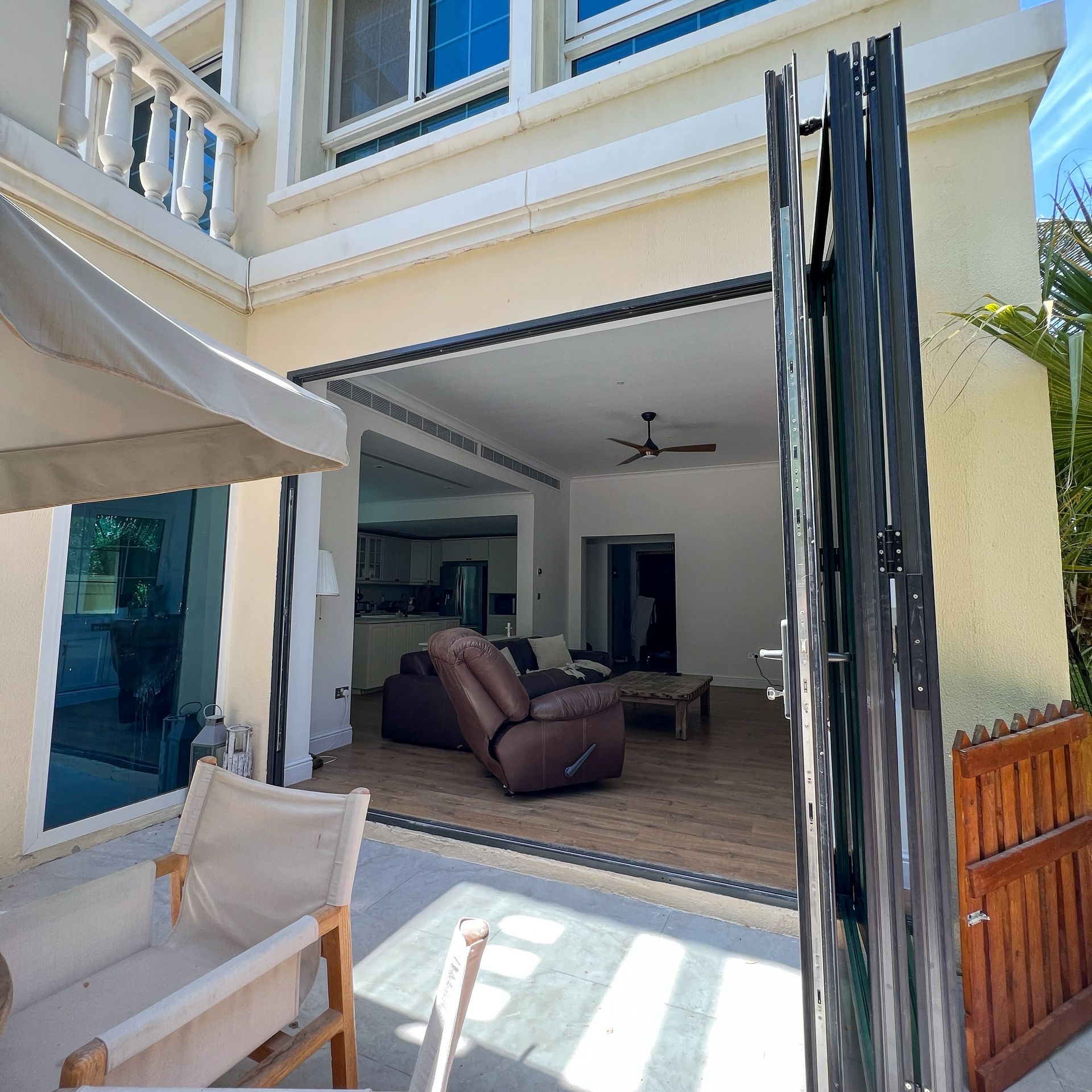 A large house with a living room and a patio area