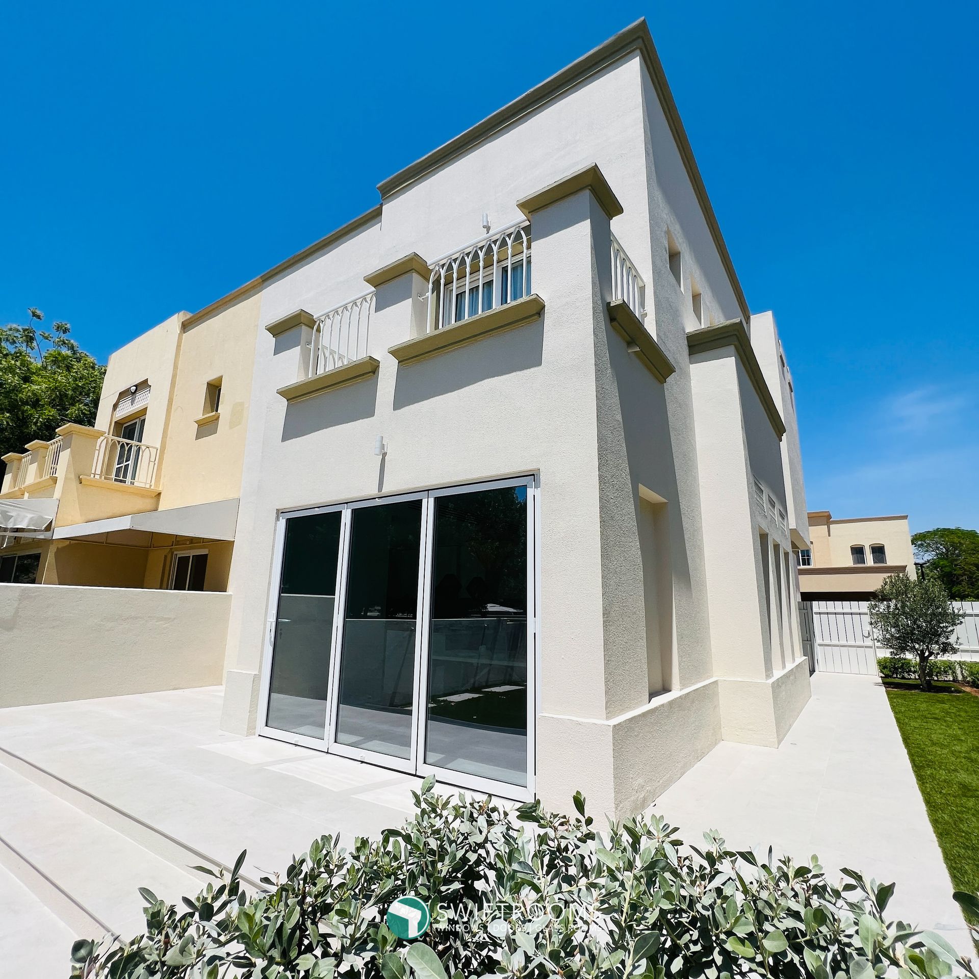A large white building with a lot of windows