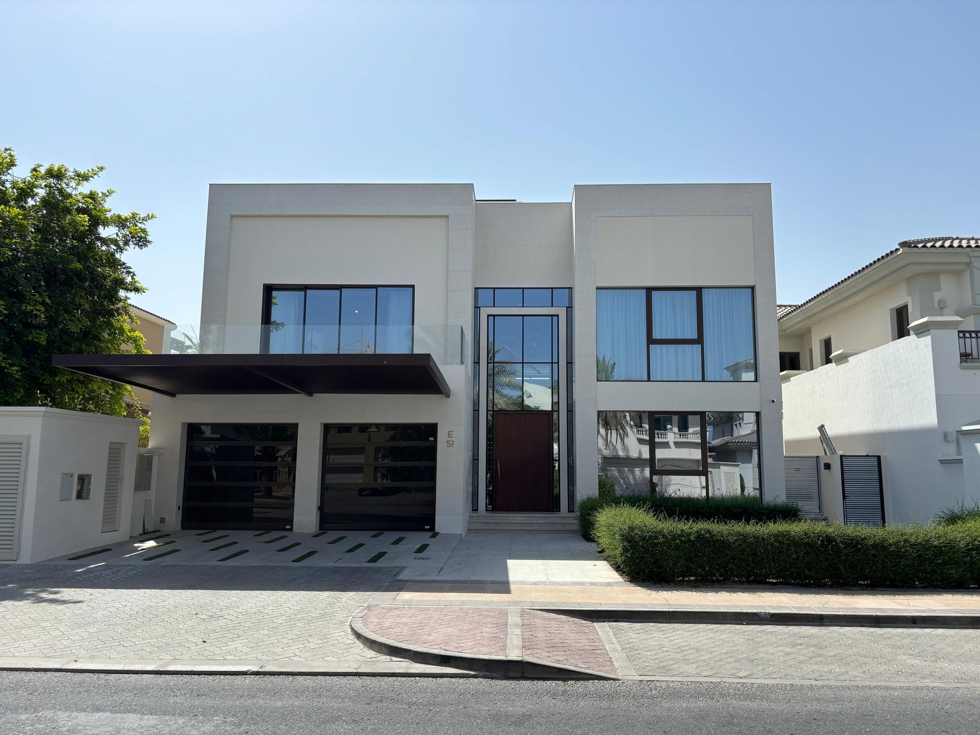 Palm villa with slimline windows