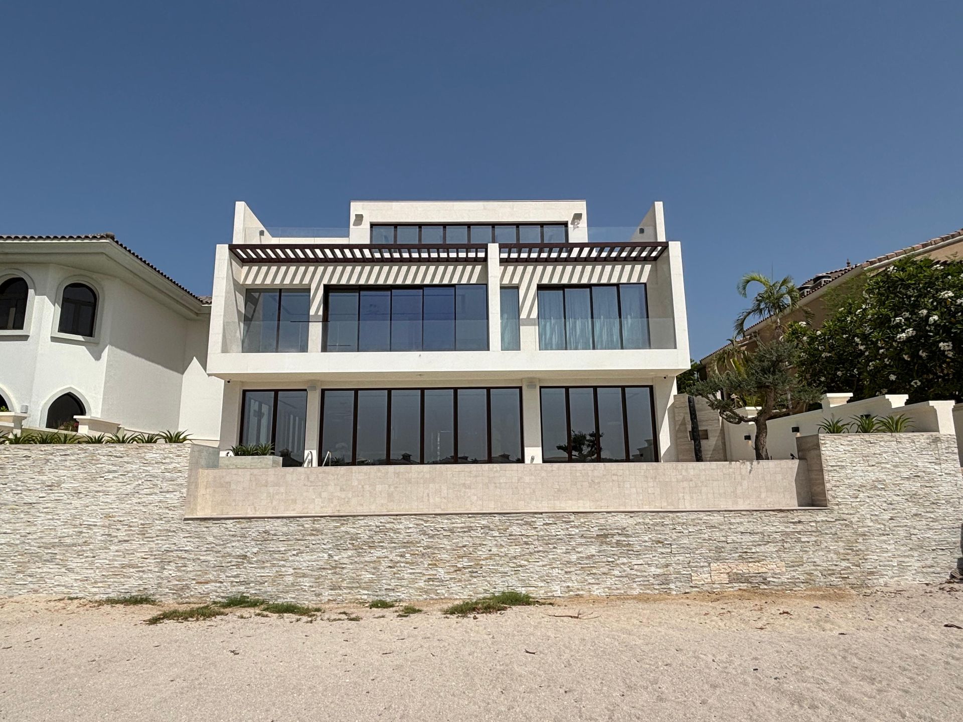 A large white house with a lot of windows