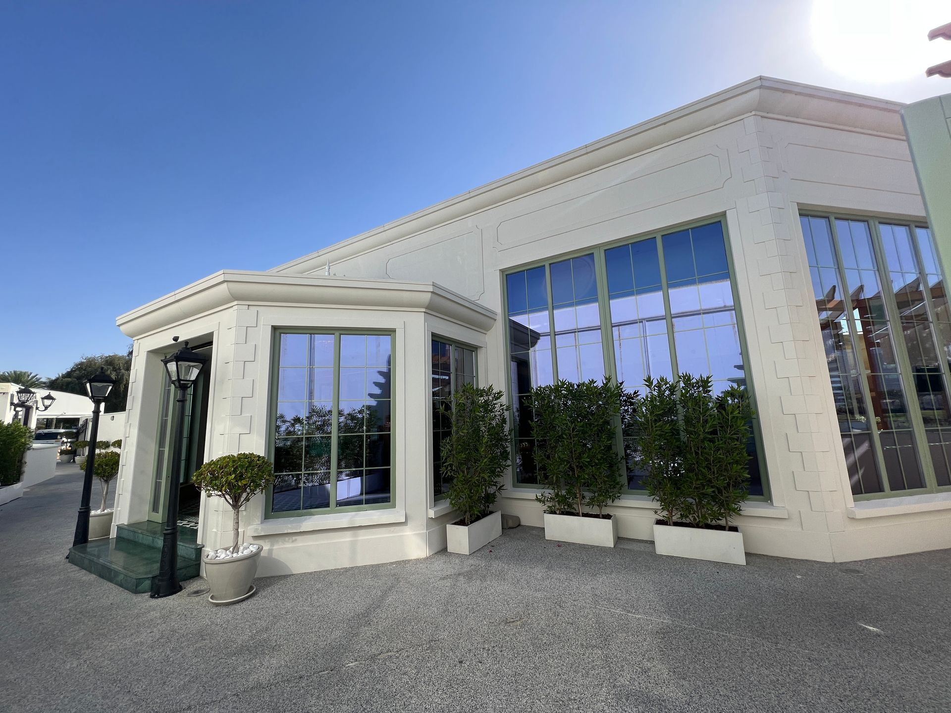 A large white building with a lot of windows