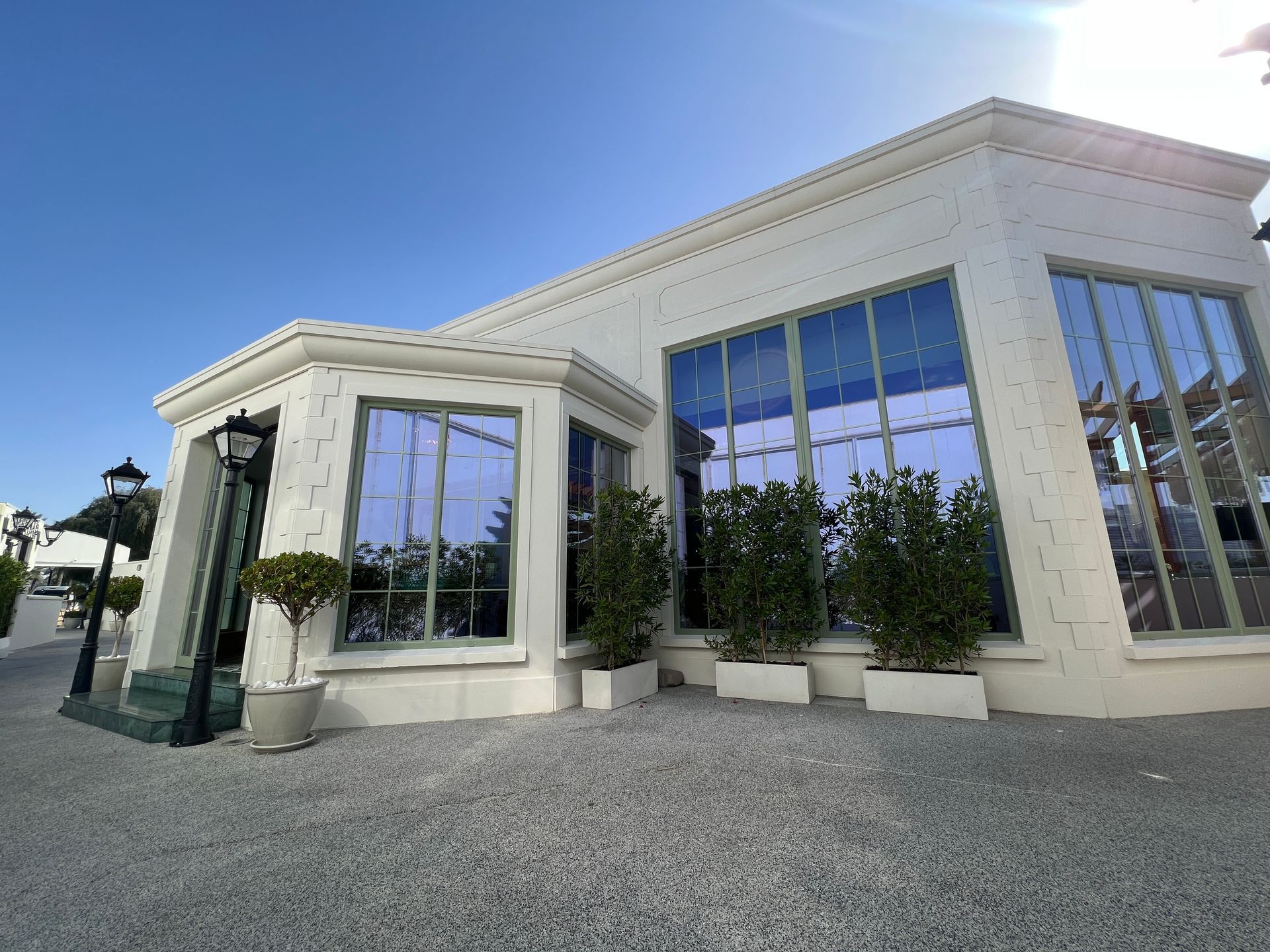 A large white building with a lot of windows