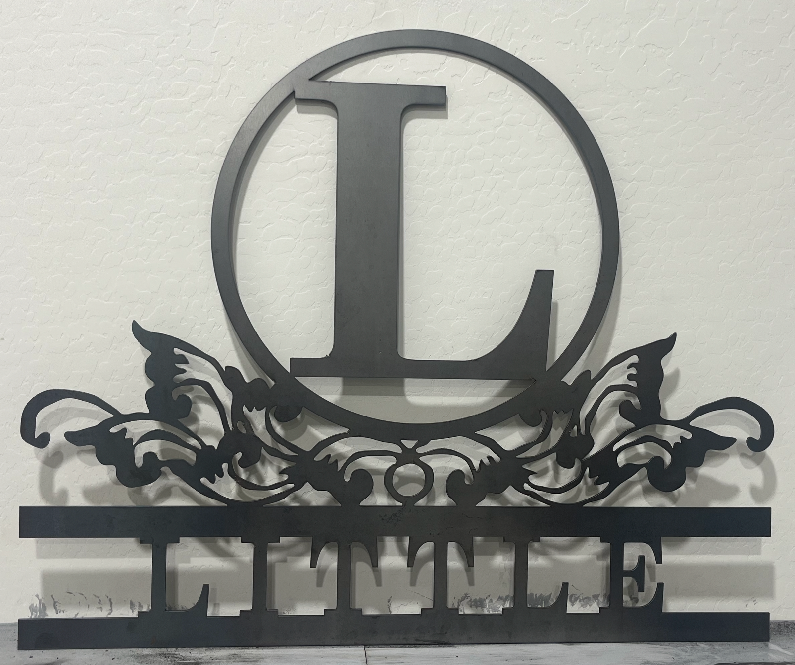 family name metal sign