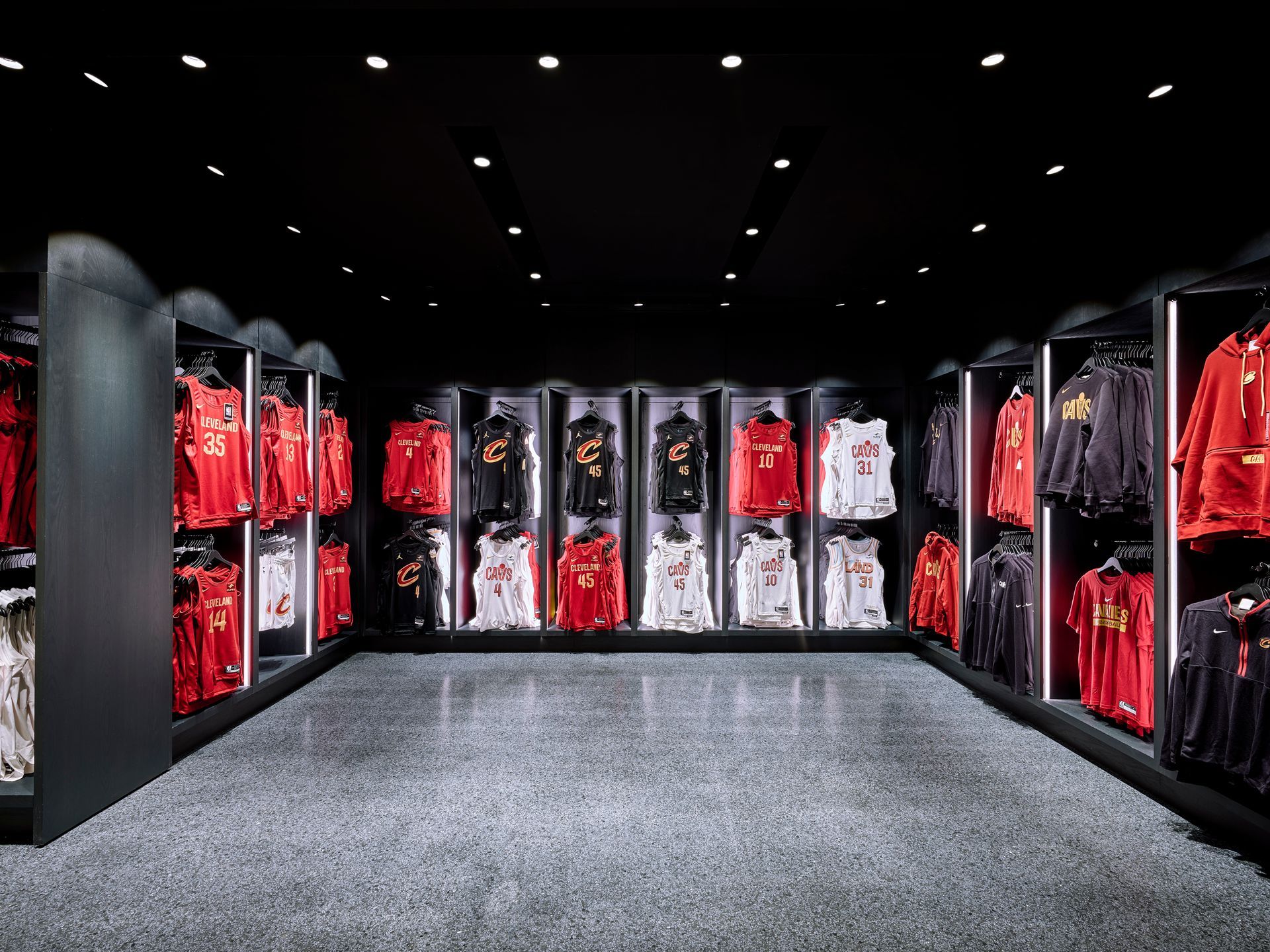 A store filled with lots of red and black shirts.