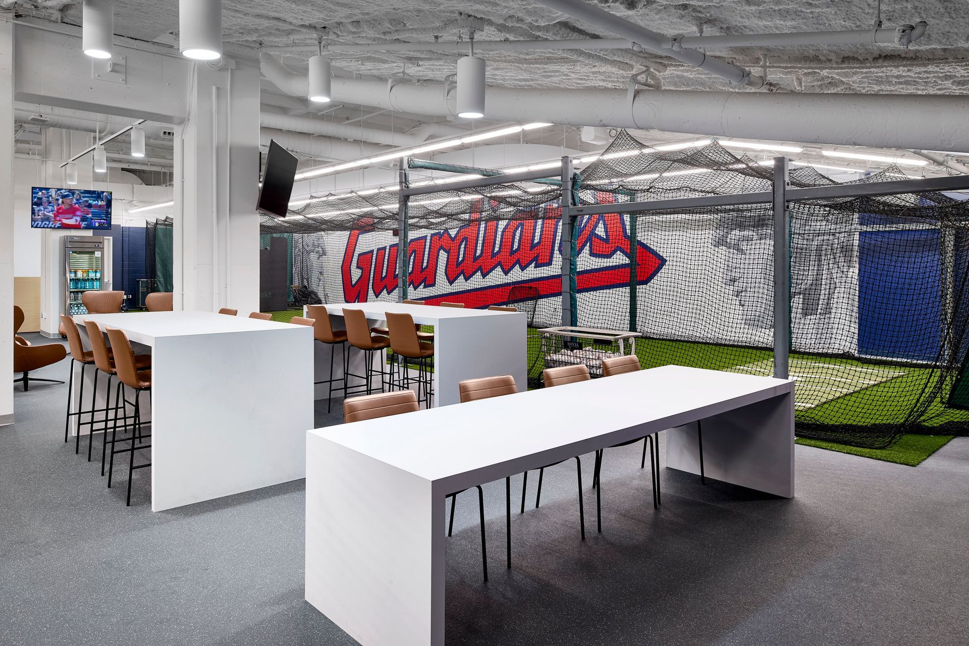 An aerial view of a baseball stadium filled with people watching a game.