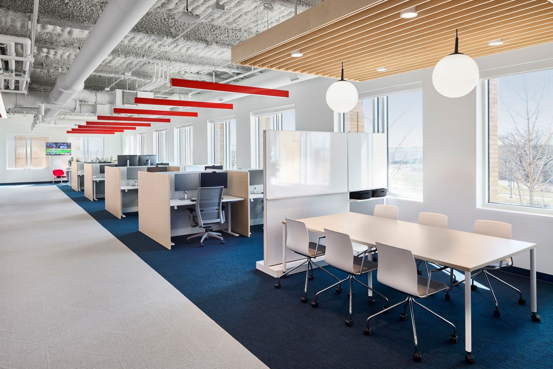 An aerial view of a baseball stadium filled with people watching a game.