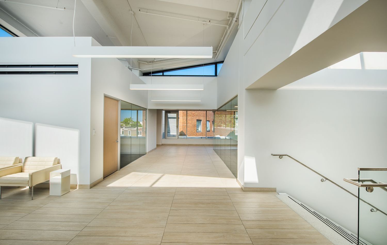 There is a staircase leading up to the second floor of the building.