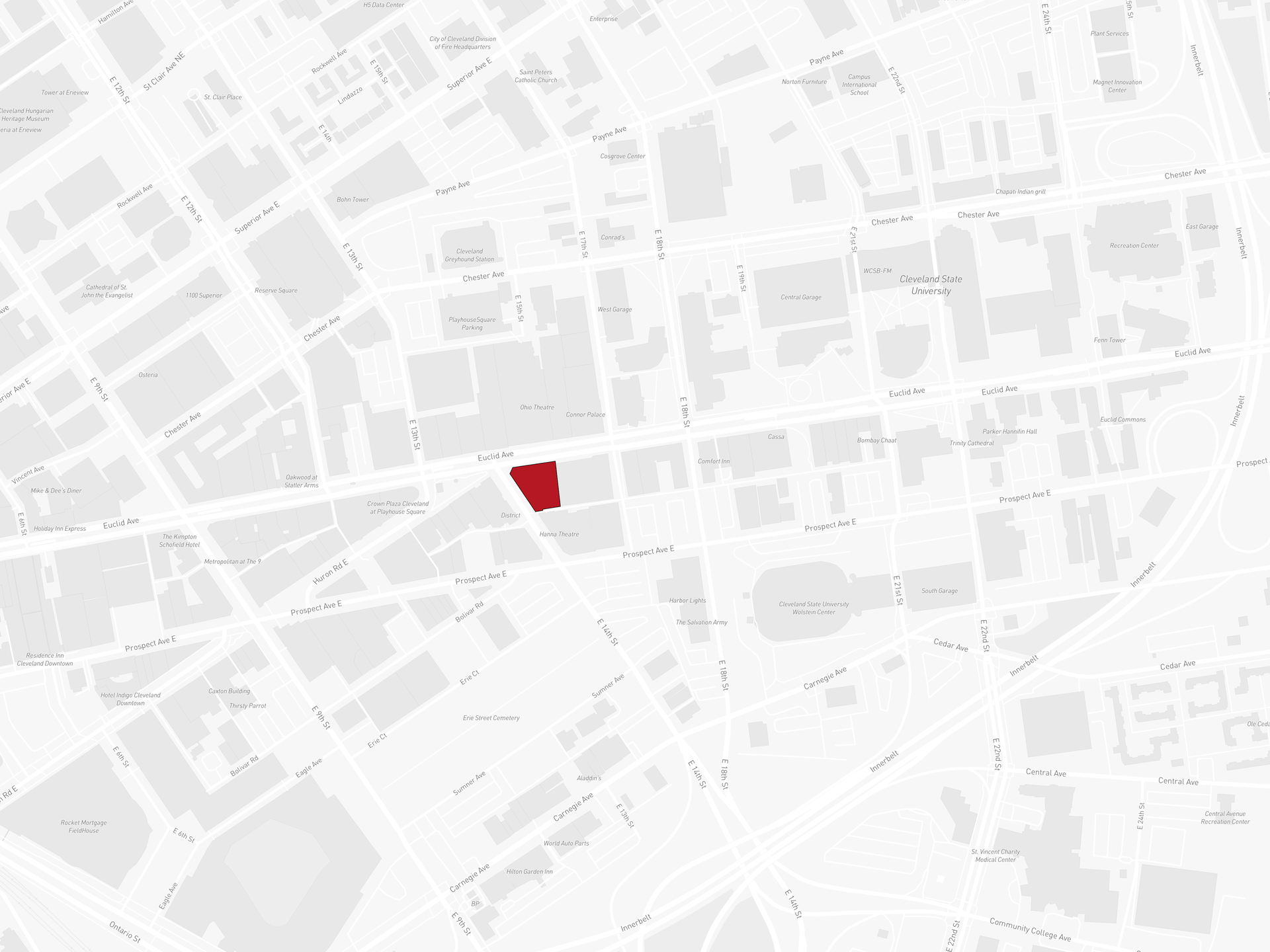 A black and white map of a city with a red square in the middle.