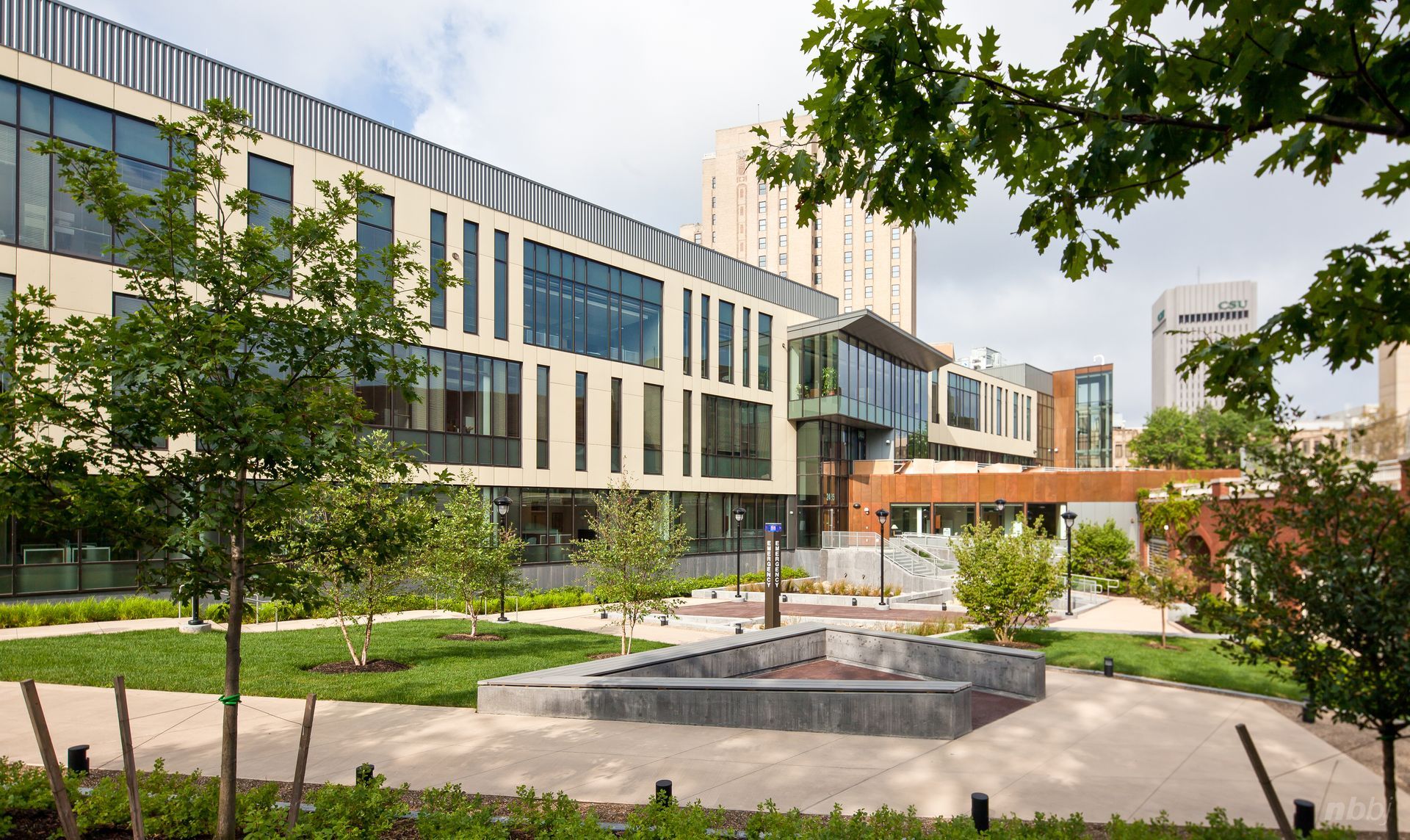 A large building with a fountain in front of it
