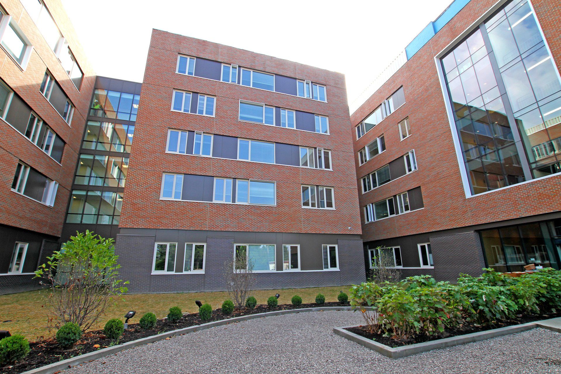 A large brick building with a lot of windows