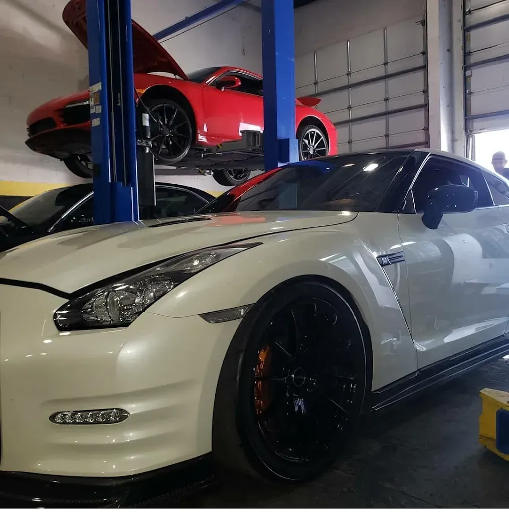 white car in the shop