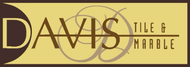 A logo for davis tile and marble with a yellow background