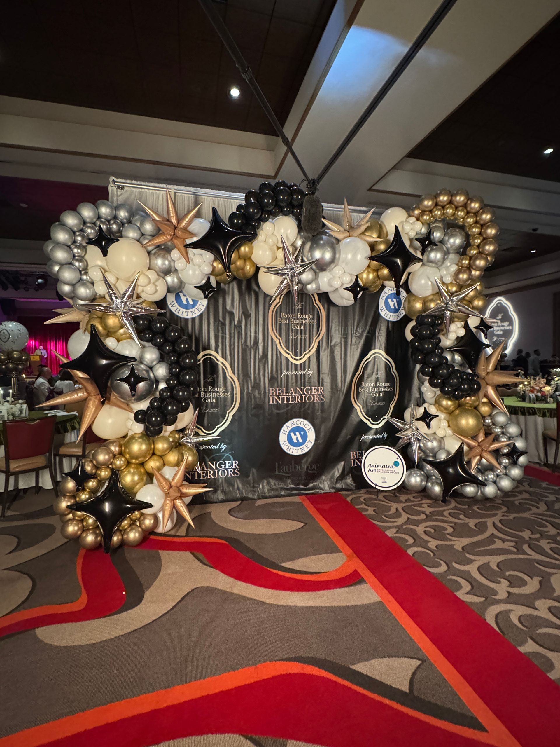 Balloon decor on step and repeat for Gala