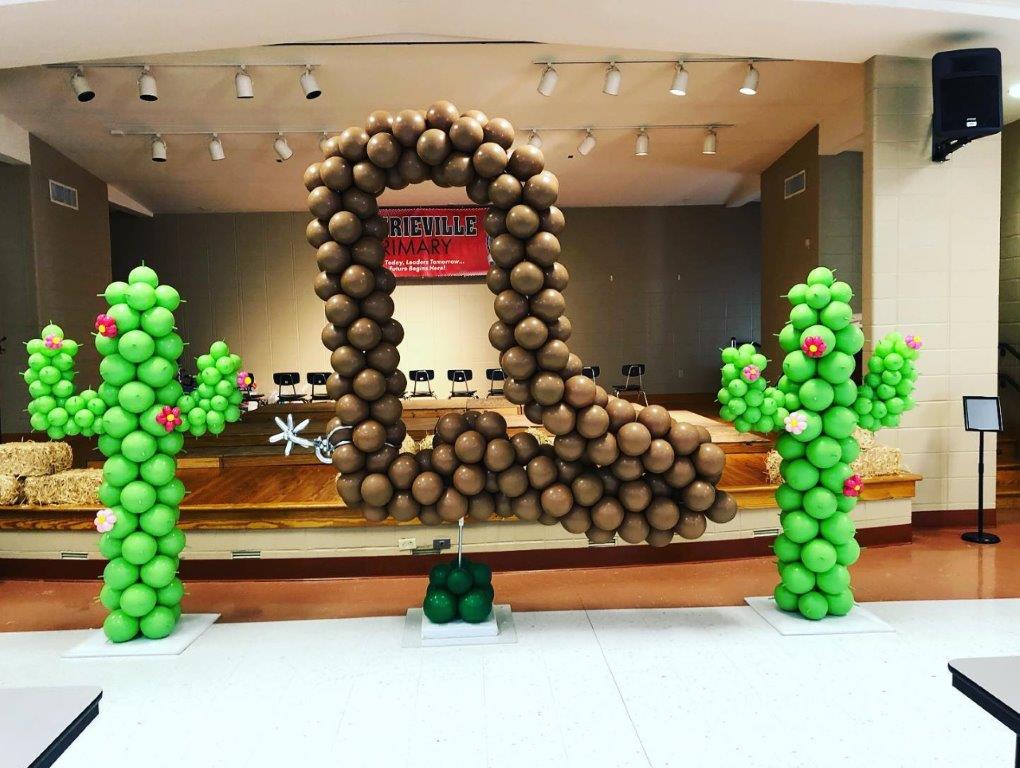Cowboy boot balloon sculpture, cactus balloon sculpture