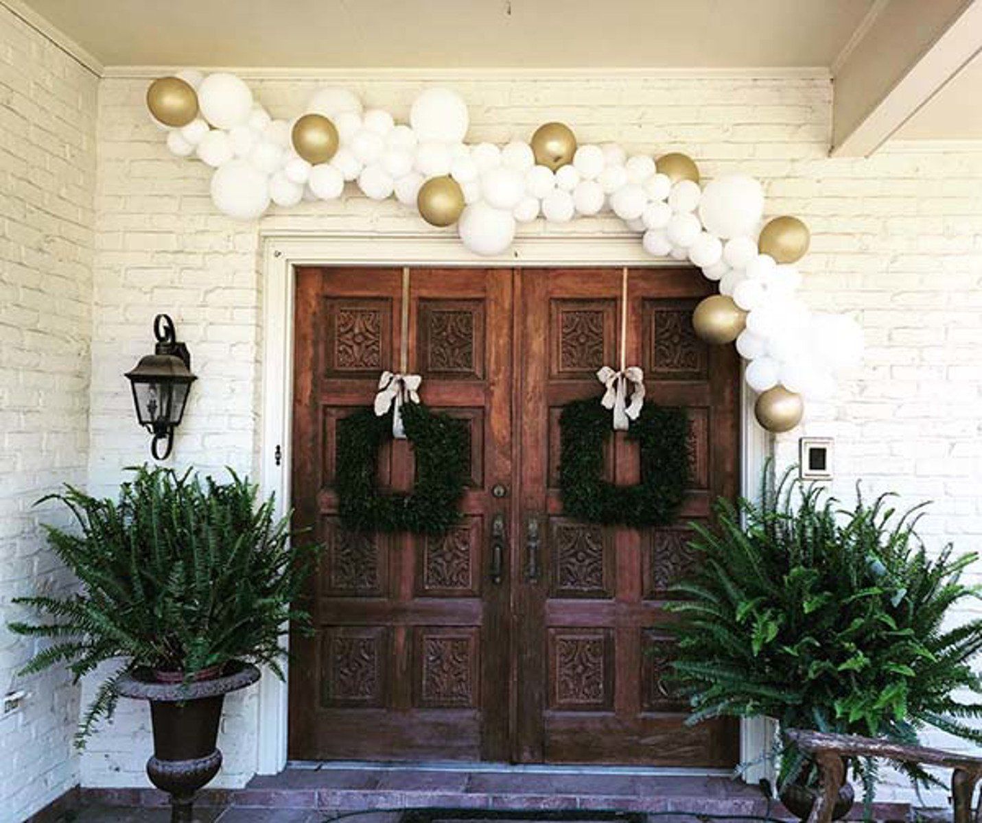 Organic garland around the entrance to your event