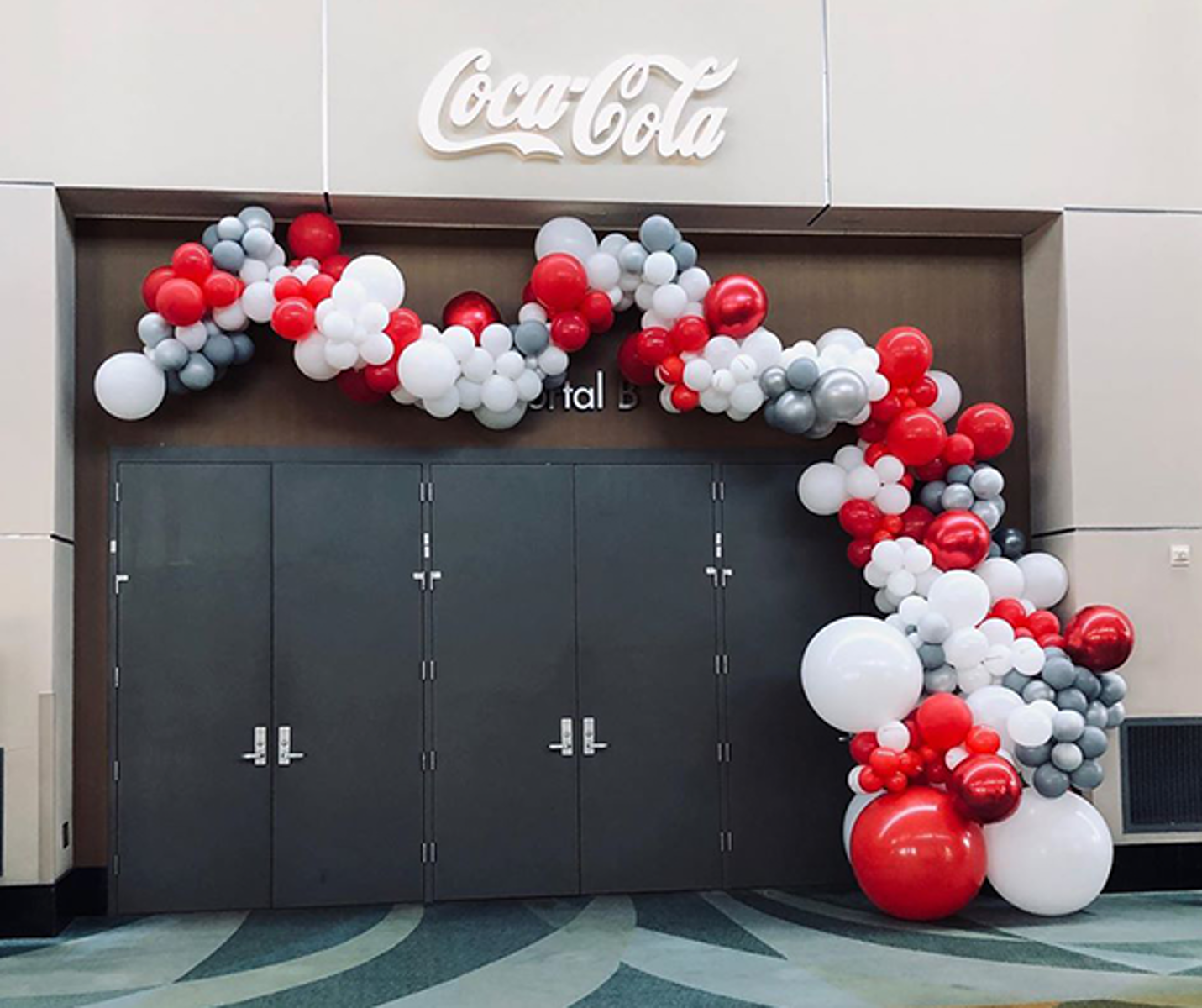 Balloon decor including garlands and balloon backdrops