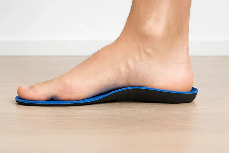 Custom orthotics being fitted by a podiatrist in Newcastle to support foot alignment and relieve pai