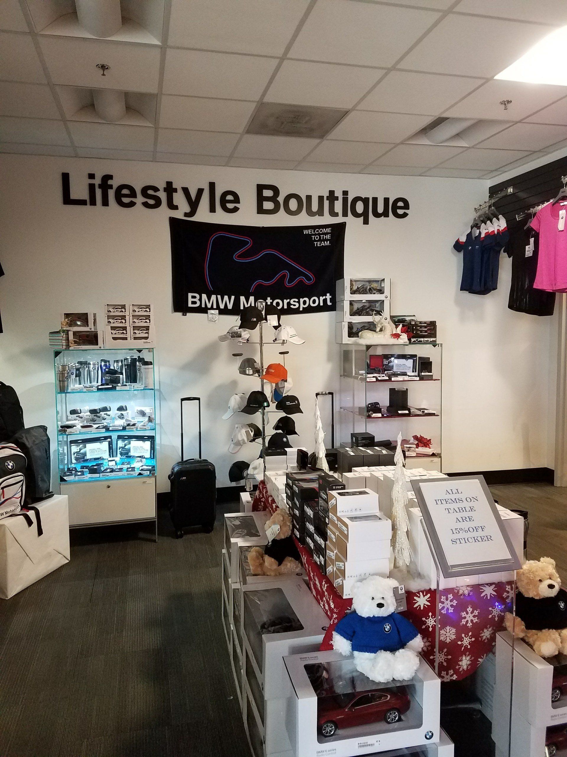 A lifestyle boutique with a bmw logo on the wall