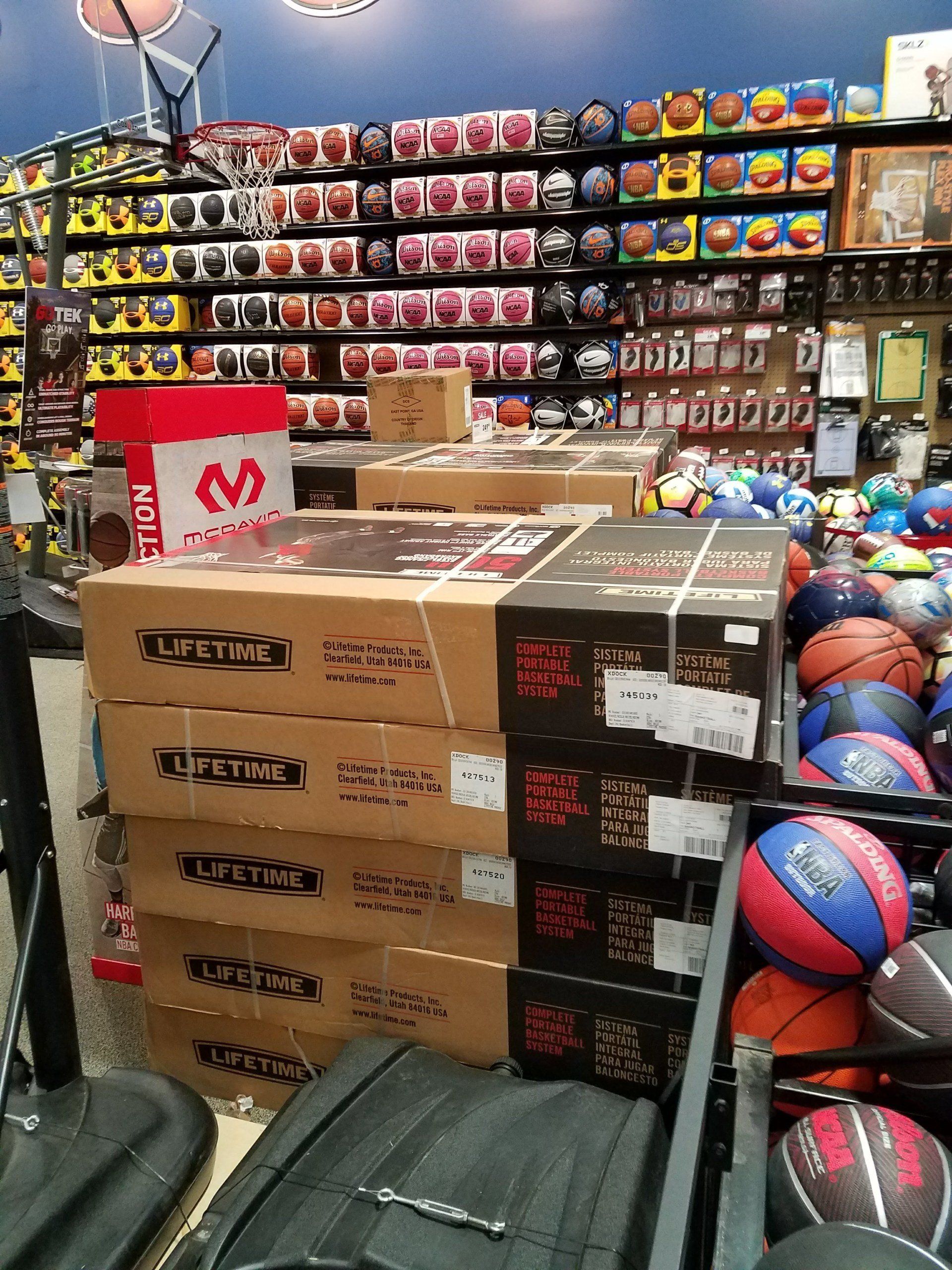 A bunch of boxes are stacked on top of each other in a store.