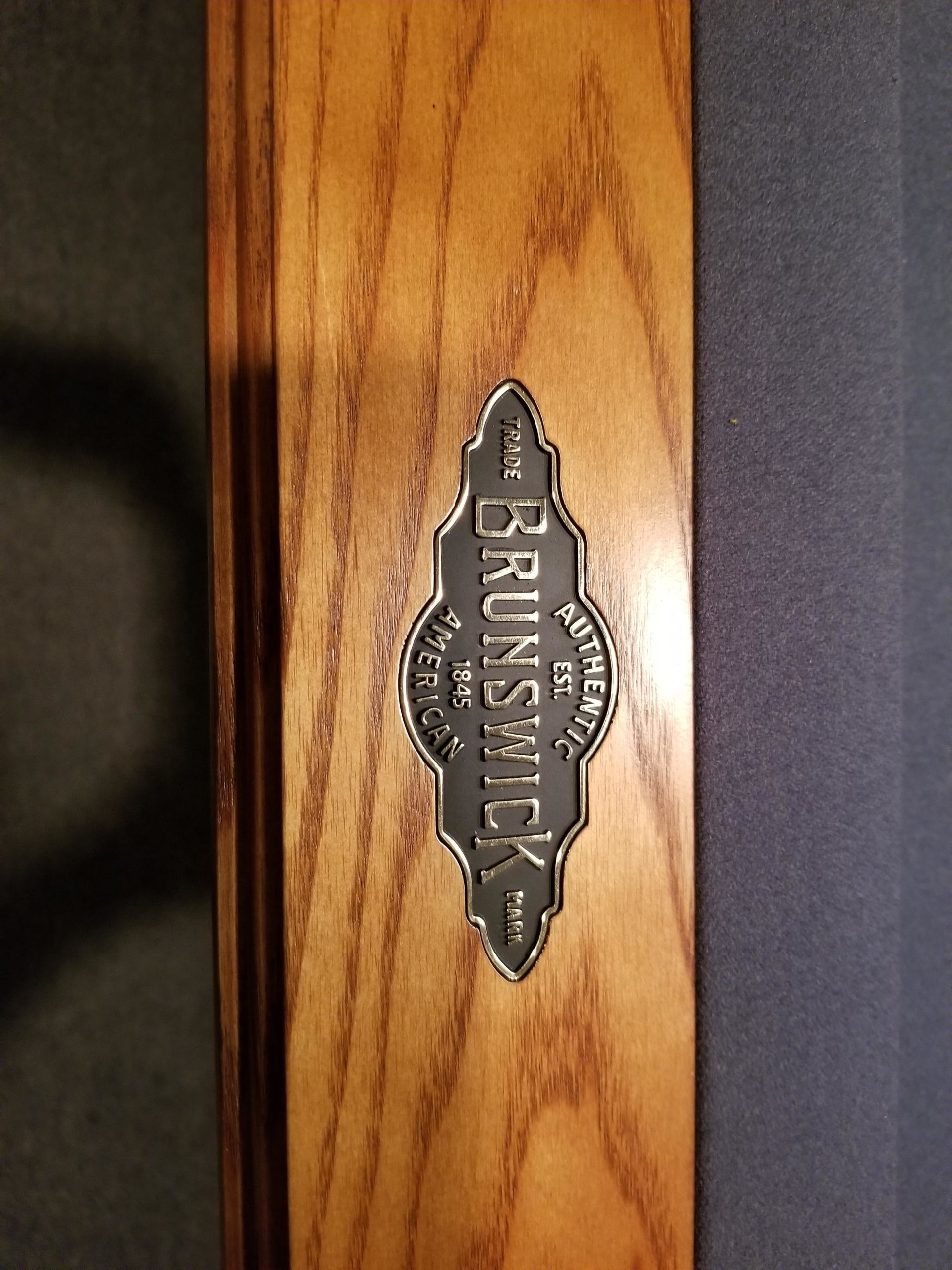 A wooden box with a label that says brunswick on it