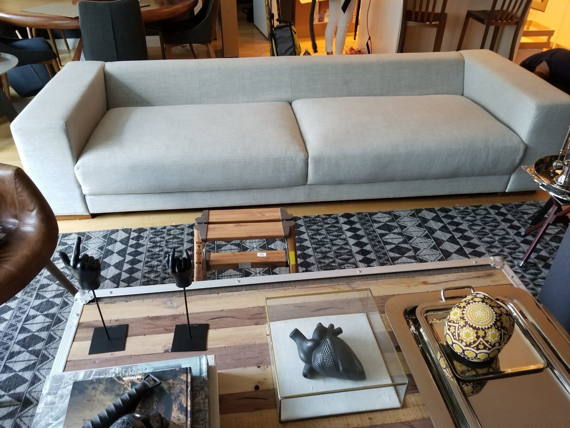 A living room with a couch and a coffee table