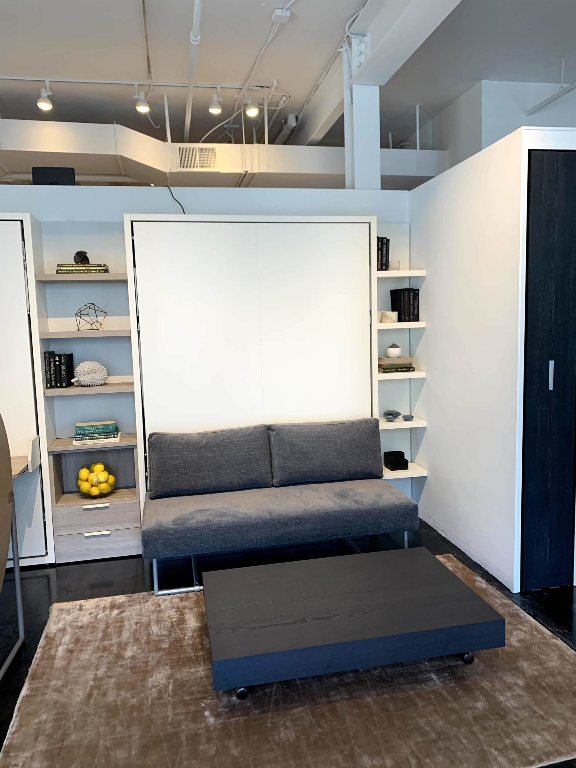 A living room with a couch and a coffee table