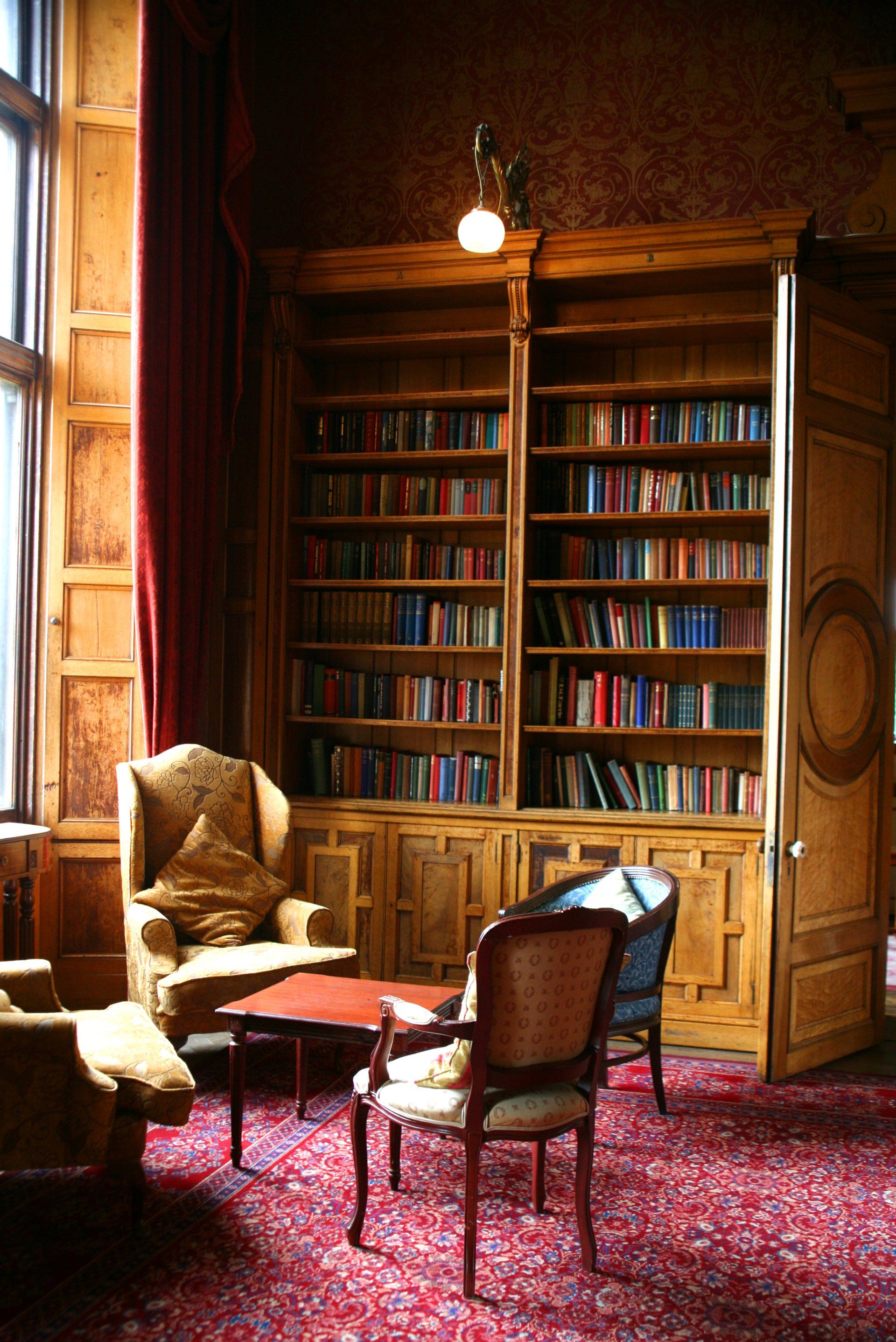 A library with a lot of books on the shelves