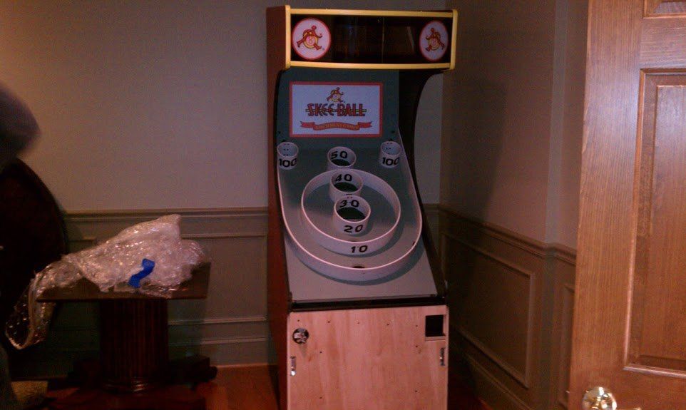 A basketball game is sitting in a room next to a door
