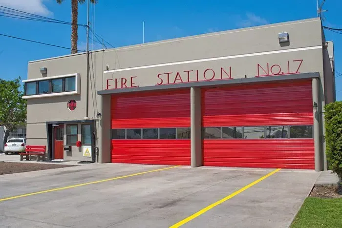 Fire Station No. 17 building with red garage doors under a clear blue sky