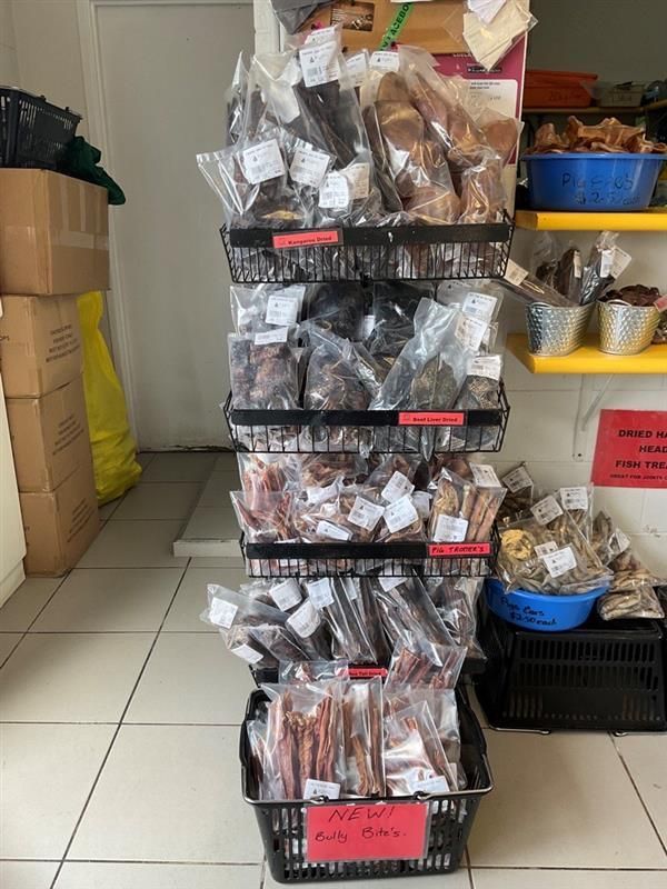 Various Pet Treats Stand In Store — Game Meat Butcher in Currajong, QLD