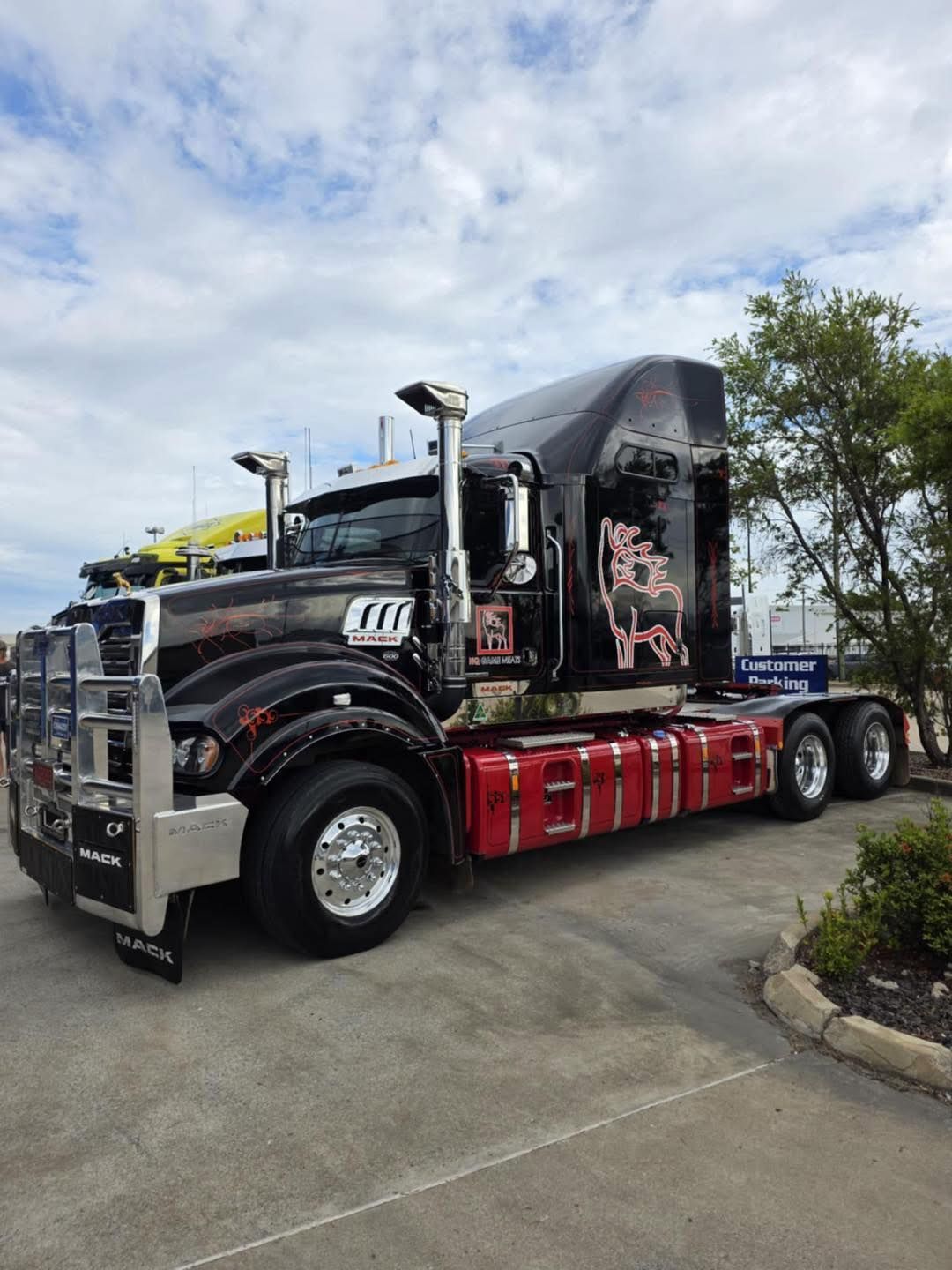 Black Mack Truck With Chrome Accents and Red Trim — NQ GAME MEAT in Aitkenvale, QLD
