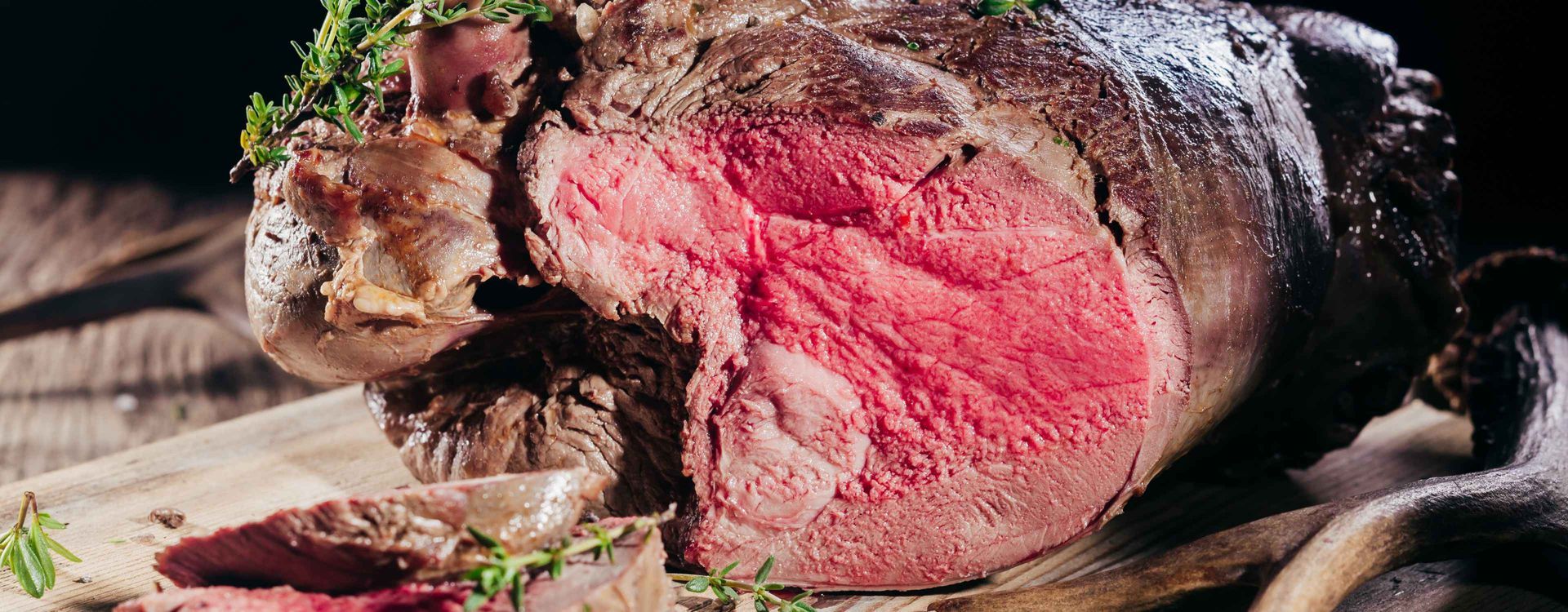 A Roasted, Sliced Red Beef Roast, With Herbs — NQ GAME MEAT in Currajong, QLD