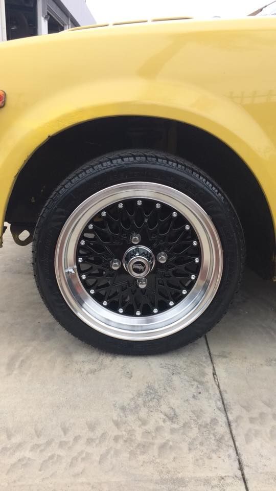 Yellow Car With Black Wheels And Tyres — Tyre Master Albury In East Albury, NSW