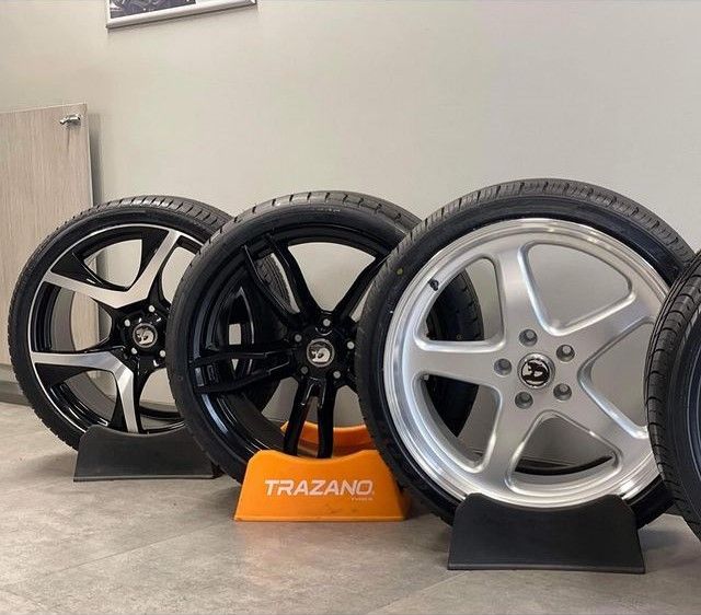 Row Of Tyres And Wheels On Display Stand — Tyre Master Albury In East Albury, NSW