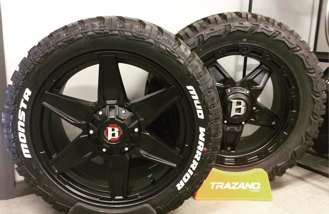 A Pair Of Black Wheels And Tires — Tyre Master Albury In East Albury, NSW