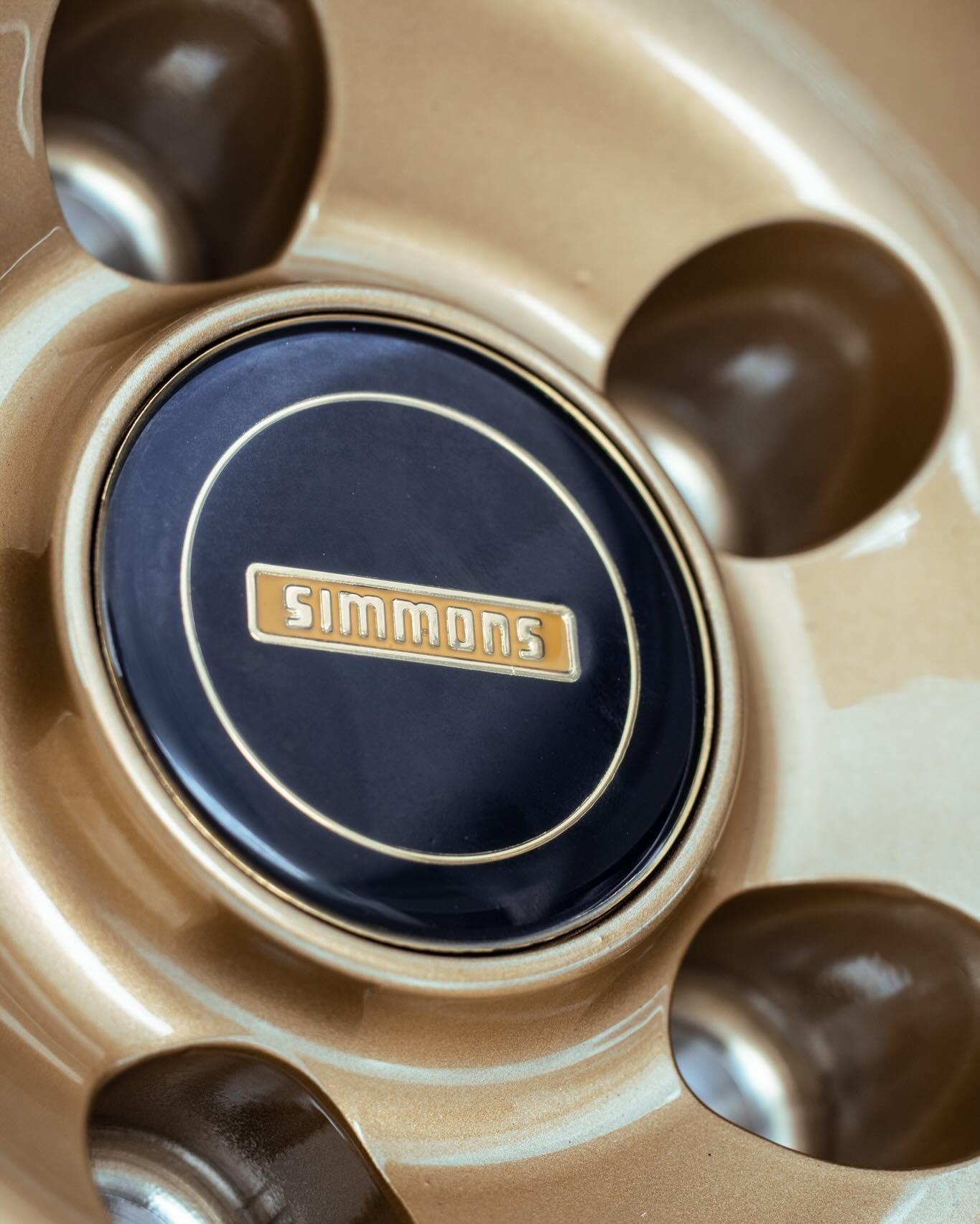 A Close Up Of A Simmons Wheel Center Cap — Tyre Master Albury In Wodonga, VIC