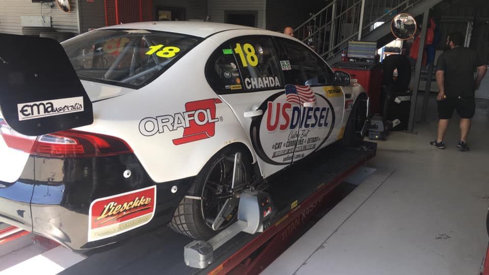 Race Car On A Lift In The Garage — Tyre Master Albury In East Albury, NSW