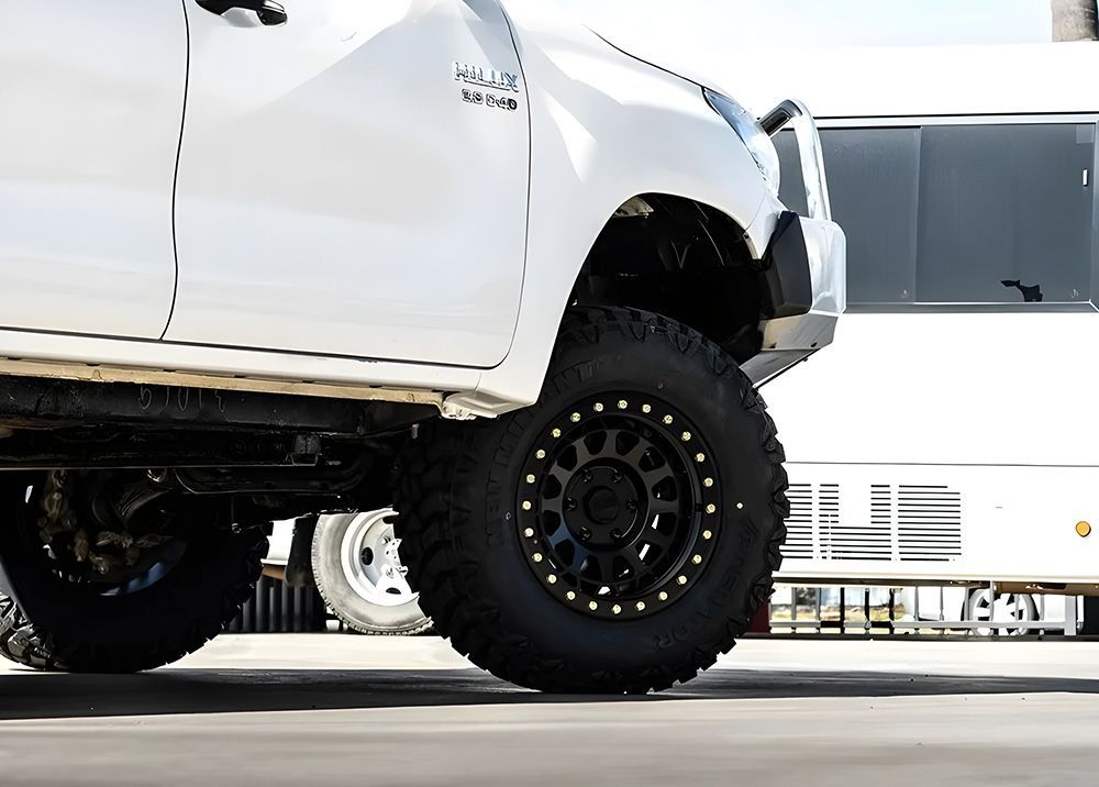 A White Vehicle with High-Quality Tyres