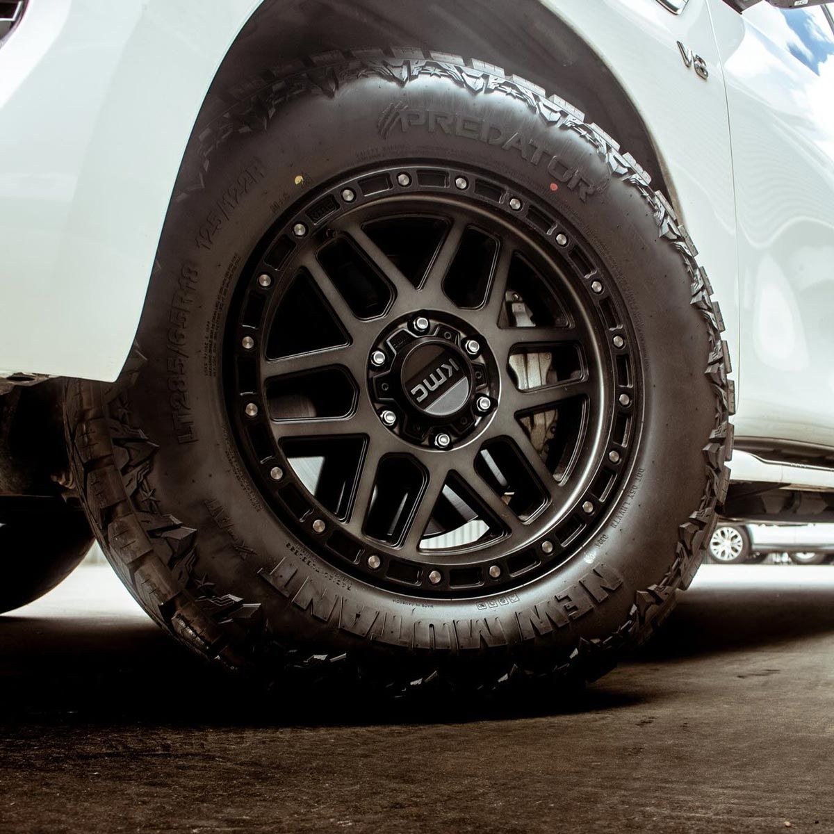 Closeup On Tyres Of A White Car — Tyre Master Albury In Wodonga, VIC