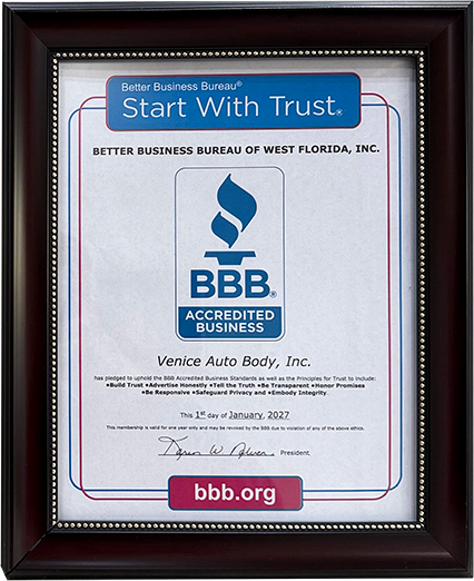 A framed Better Business Bureau Accredited Business certificate for Venice Auto Body, Inc., dated January 12, 2017.