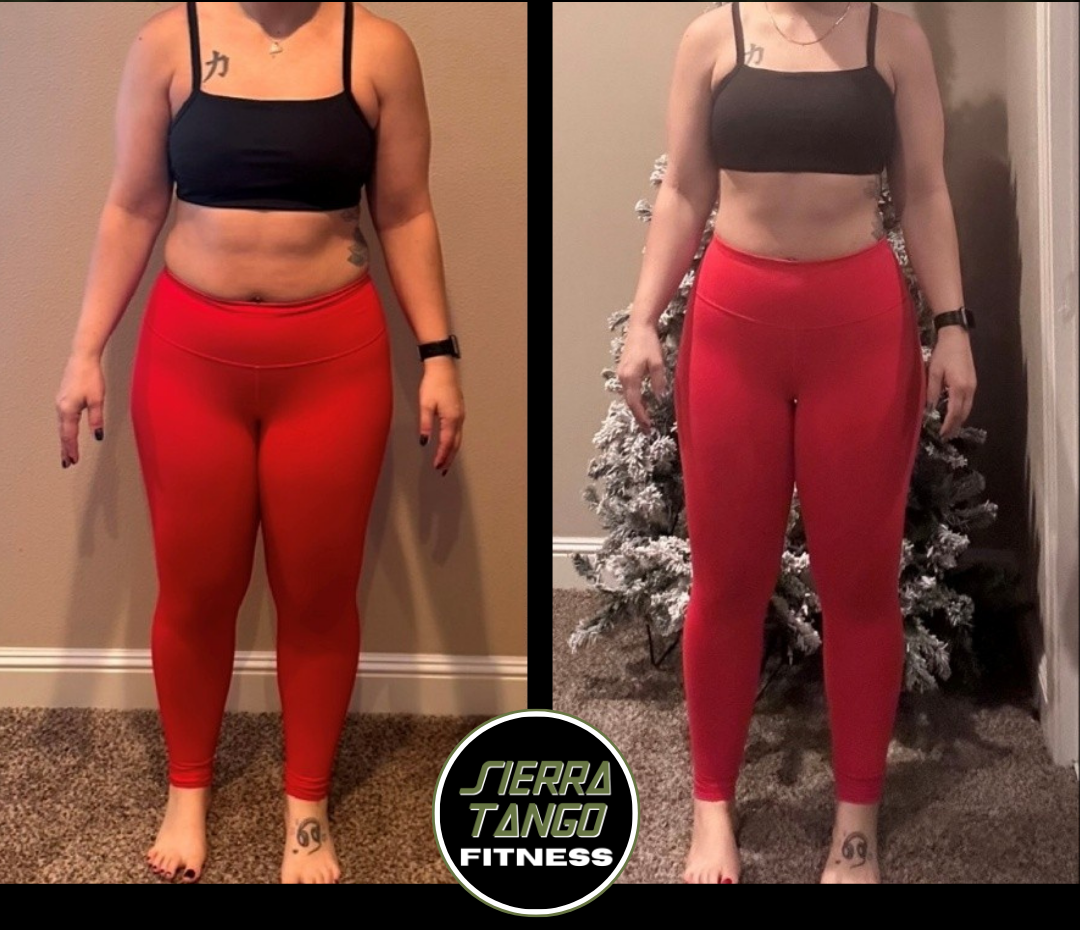 A man is walking through a gym holding a barbell.