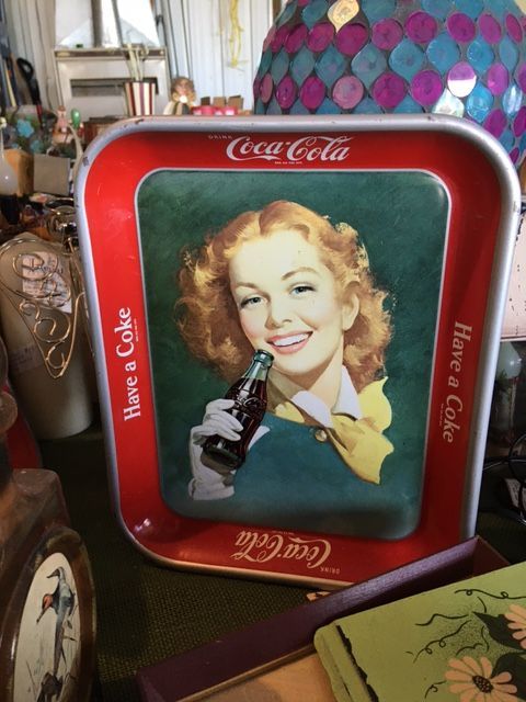 Coca-Cola serving tray with smiling woman holding a bottle, red border, 