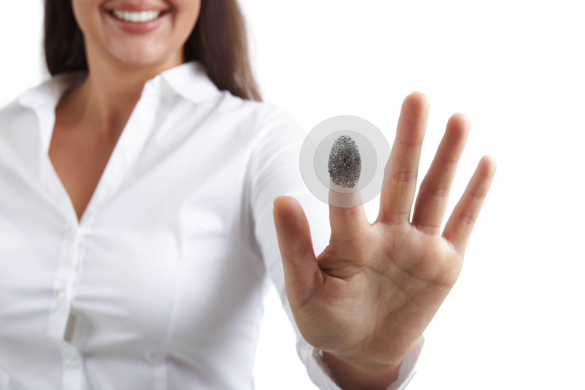 A woman is holding up her hand with a fingerprint on it.