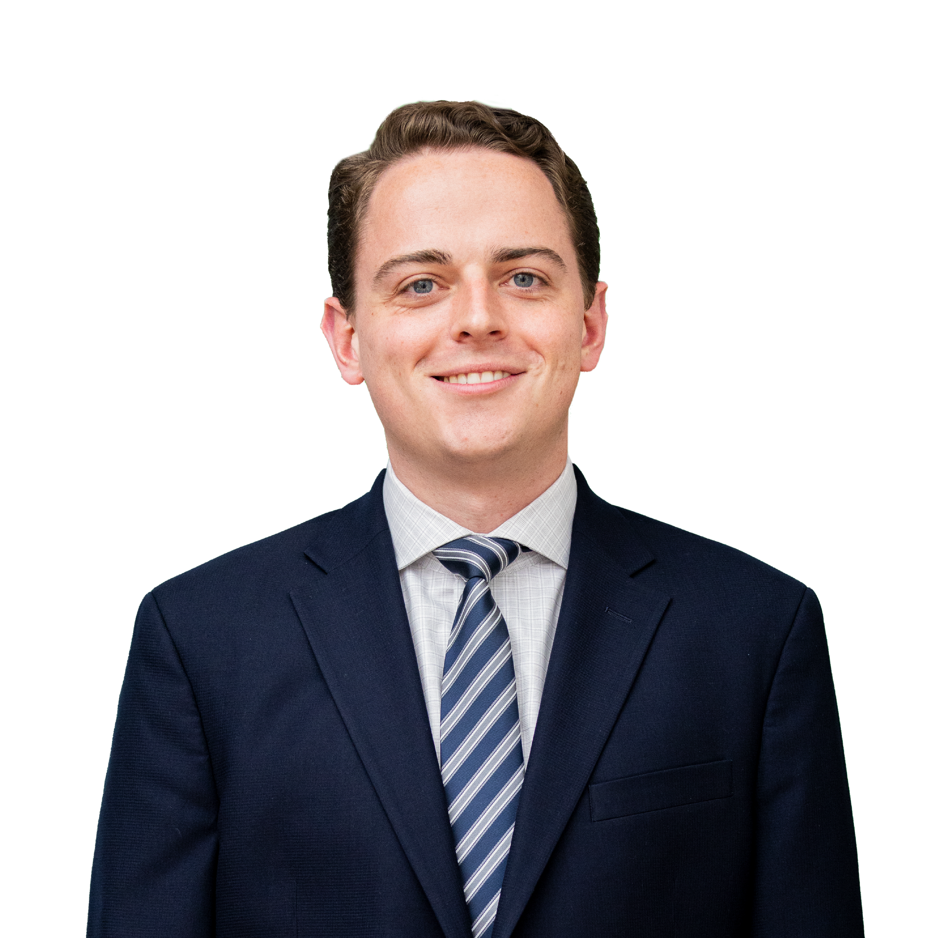 A woman wearing glasses and a black jacket smiles for the camera