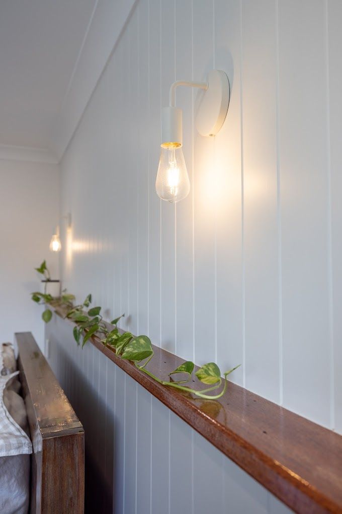 Empty Room With Hardwood Floors , White Walls and French Doors — Ironbark Built Townsville in Mundingburra, QLD